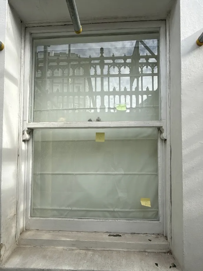 Window joints before epoxy and conservation repair — scope marked on site