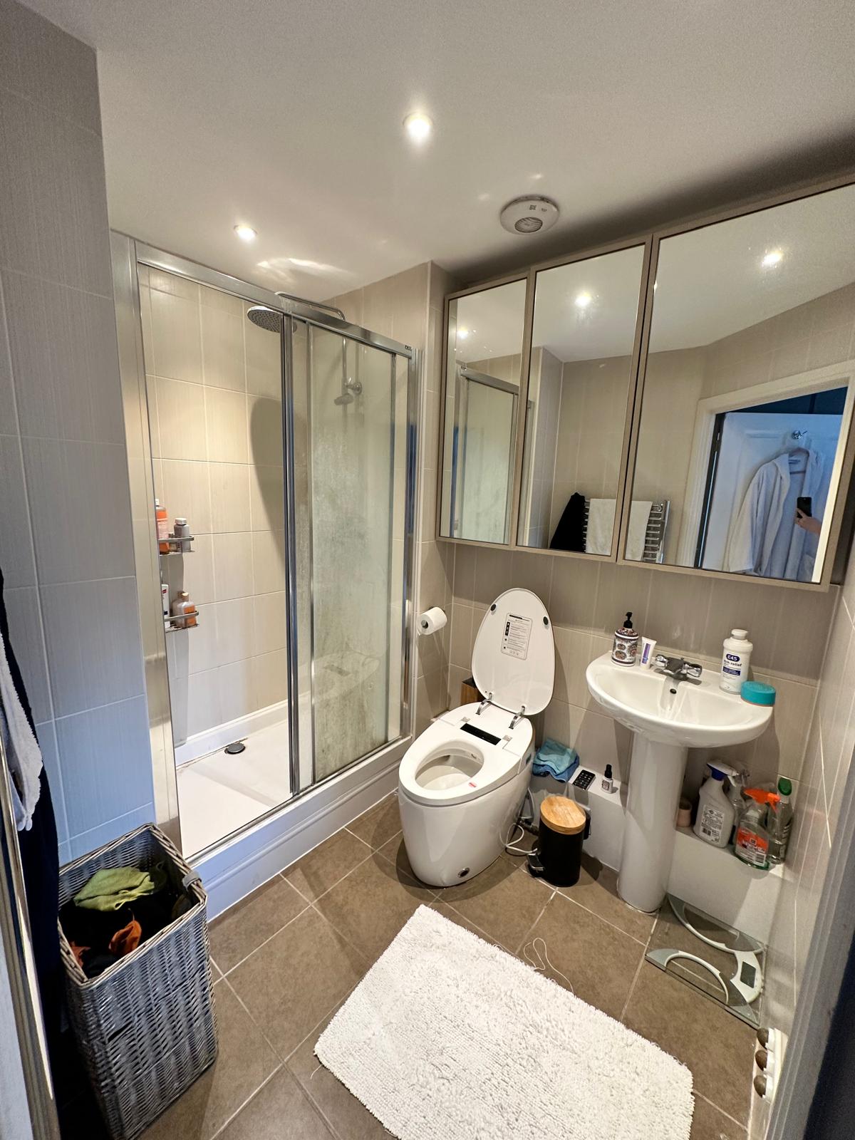 Dated tiled bathroom before refurbishment
